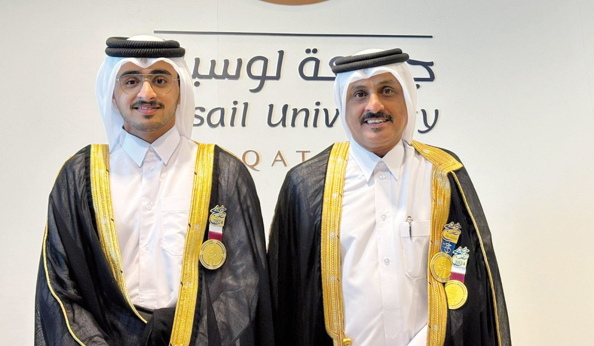 Father-son duo graduate together at Lusail University